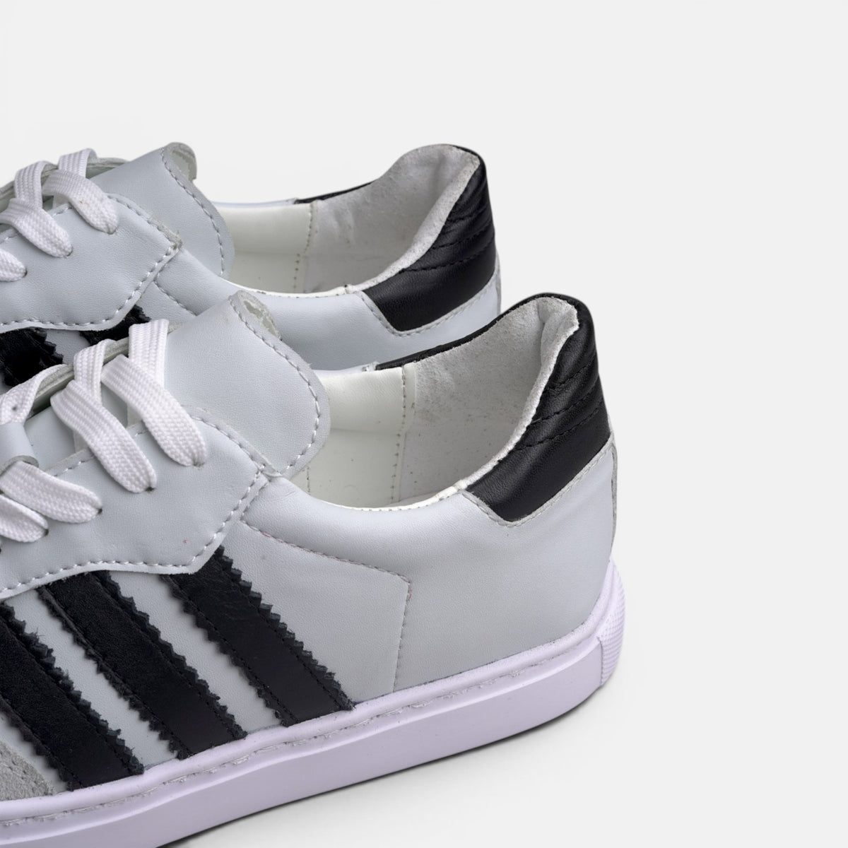 Volzak 714 Basket en cuir Blanc Noir